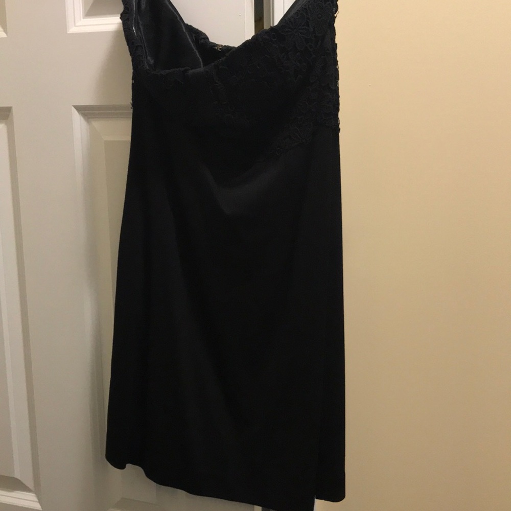 Black mini dress with floral lace pattern